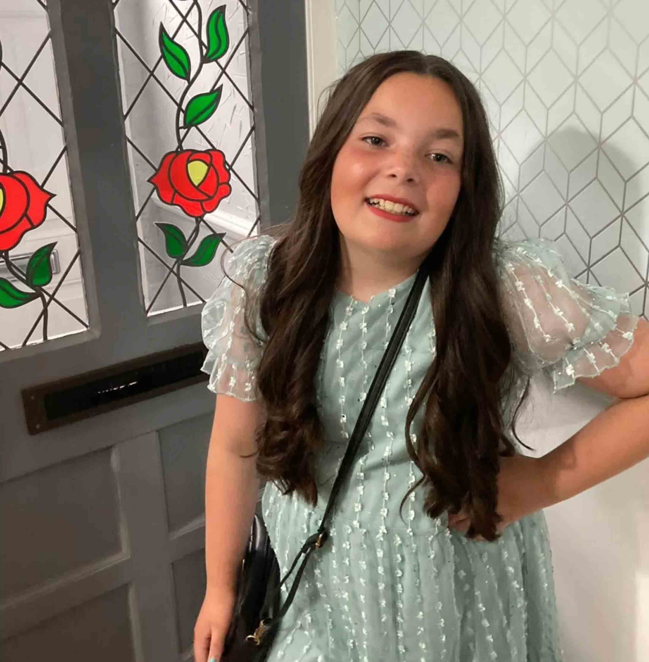 Happy child with new wig